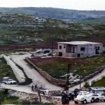 The DFF half track is to the left of the building. C Coy personnel at the check point UNIFIL