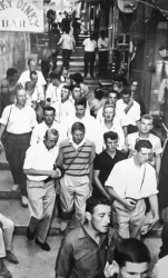 CS Ryan photographed while on a tour of the old city in Jerusalem from Cyprus in 1964, he is on the left of the photo with the strap of the camera case visible on his right shoulder. Photo credit: private collection of the late Lt Col Pearse McColey