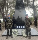Sgt Martin Tynan and with Maj Gen Adrian Ó Murchú at the Tibnine Memorial.  Photo Credit: DF PR Branch. Sergeant Tynan Son of Cpl Martin Tynan