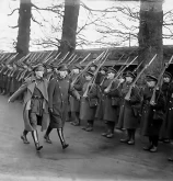 Gen Mulcahy (with greatcoat open)  leaving Infirmary Rd to drive to Royal Bks General Mulcahy (with greatcoat open) leaving Infirmary Roadd to drive to Royal Bks
