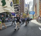 Martin O’Connor (with spectacles) is in the centre rank behind the banner. ANZAC Day, 25 Apr 2023