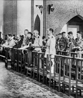 The funeral mass at the Church of St Marie in Leopoldville on 31 Oct 1960, from the right in the front row in uniform: Maj Gen Carl Carlsson von Horn, Lt Col Feardorcha Mac An Leagha and Lt Col Mortimer Buckley, OC 32 Inf Bn. Photo credit: Military Archives. Church of St Marie in Leopoldville