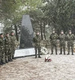 Cpl Martin Tynan (centre) with his Cav Corps colleagues from 41 Inf Gp laying a wreath on 13 Dec 2013. Photo Credit: DF PR Branch