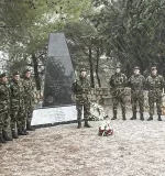 Cpl Martin Tynan (centre) with his Cav Corps colleagues from 41 Inf Gp laying a wreath on 13 Dec 2013. Photo Credit: DF PR Branch