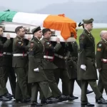 Removal of Pte Rooney's remains at Baldonnel